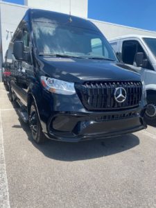Black Mercedes Sprinter van exterior, custom conversion by Luxury Group Mfg