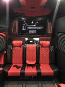 Cream leather van conversion interior with premium multi-row seating