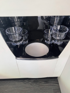 Custom chrome and wood cupholder console detail, fabrication by Luxury Group Mfg